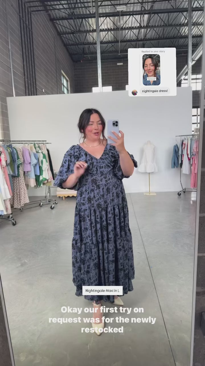 woman wearing bump friendly navy blue floral maxi dress with flowy sleeves and flowy skirt, perfect for bridal showers, weddings, church, baby showers, special events, easter and family photo shoots